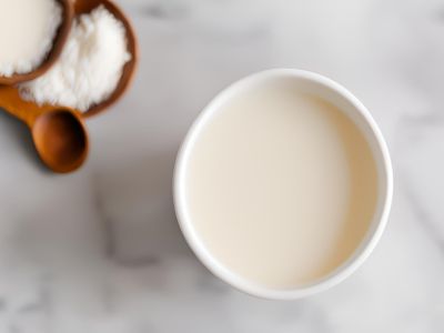 Hazelnut Milk Recipe with a cup of milk