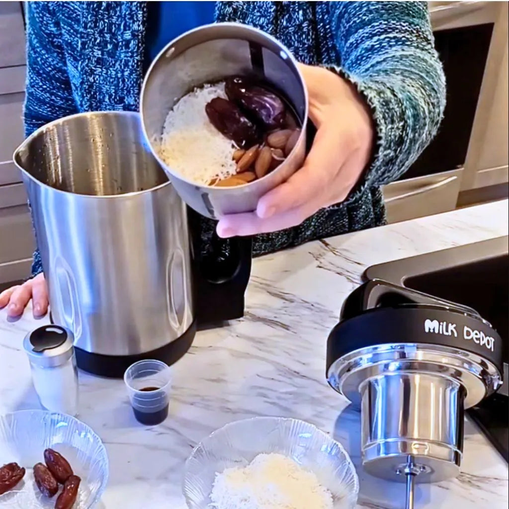 The almond milk maker's filter basket catches pulp for smooth, creamy almond milk.